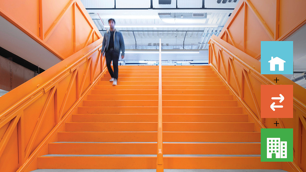 A person walking up a flight of stairs.